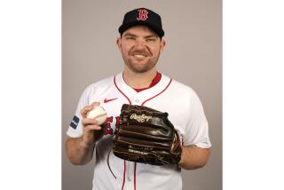 FILE - This is a 2024 photo of Liam Hendriks of the Boston Red Sox baseball team The Red Sox announced on Tuesday, Feb. 20, 2024, that they signed the 35-year-old free agent right-hander to a two-year contract with a mutual option for 2026. (AP Photo/Gerald Herbert)