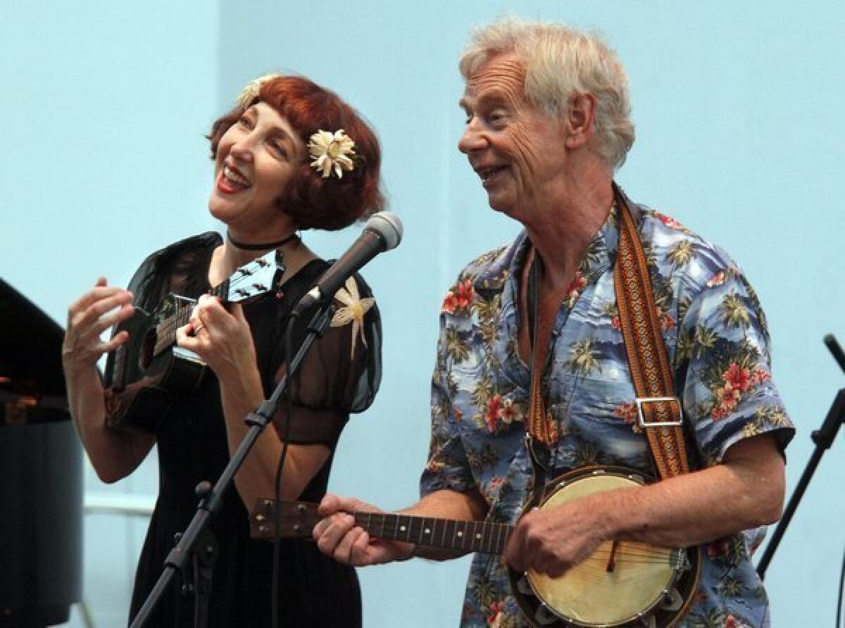 Janet Klein, shown performing with veteran British musician Ian Whitcomb in July in Fullerton, celebrates her 100th performance in Hollywood with her band the Parlor Boys on April 4.