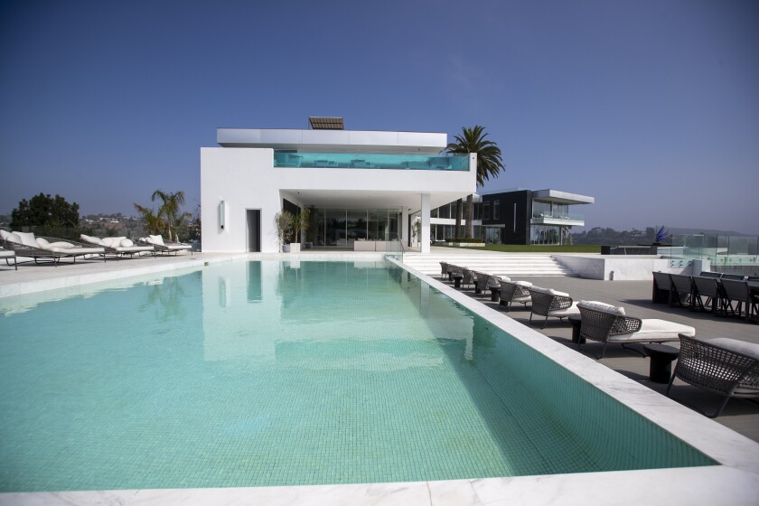 A view of a bedroom with private pool 