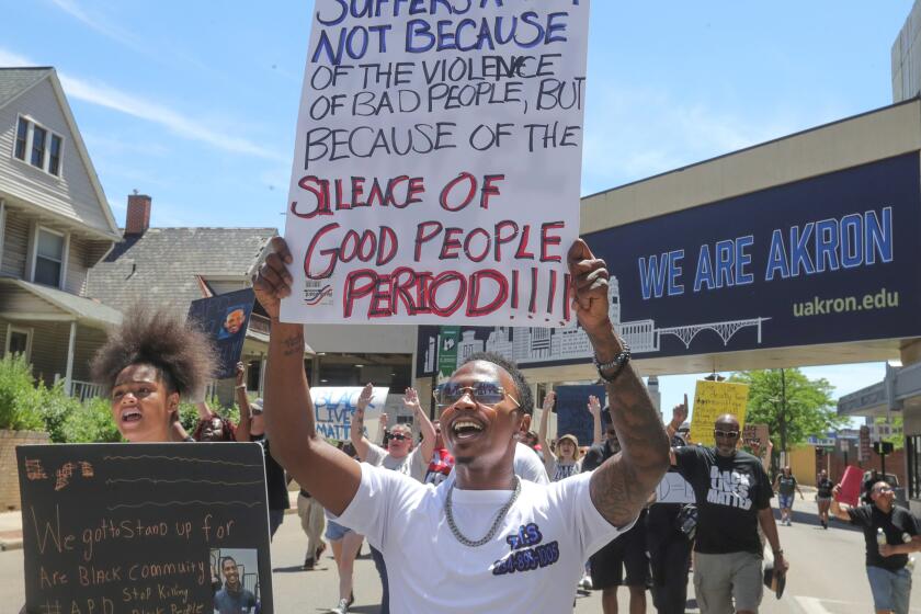 Protesters march along South High Street on Saturday, July 2, 2022 in Akron, Ohio, calling for justice for Jayland Walker after he was fatally shot by Akron Police on Monday. (Phil Masturzo/Akron Beacon Journal via AP)