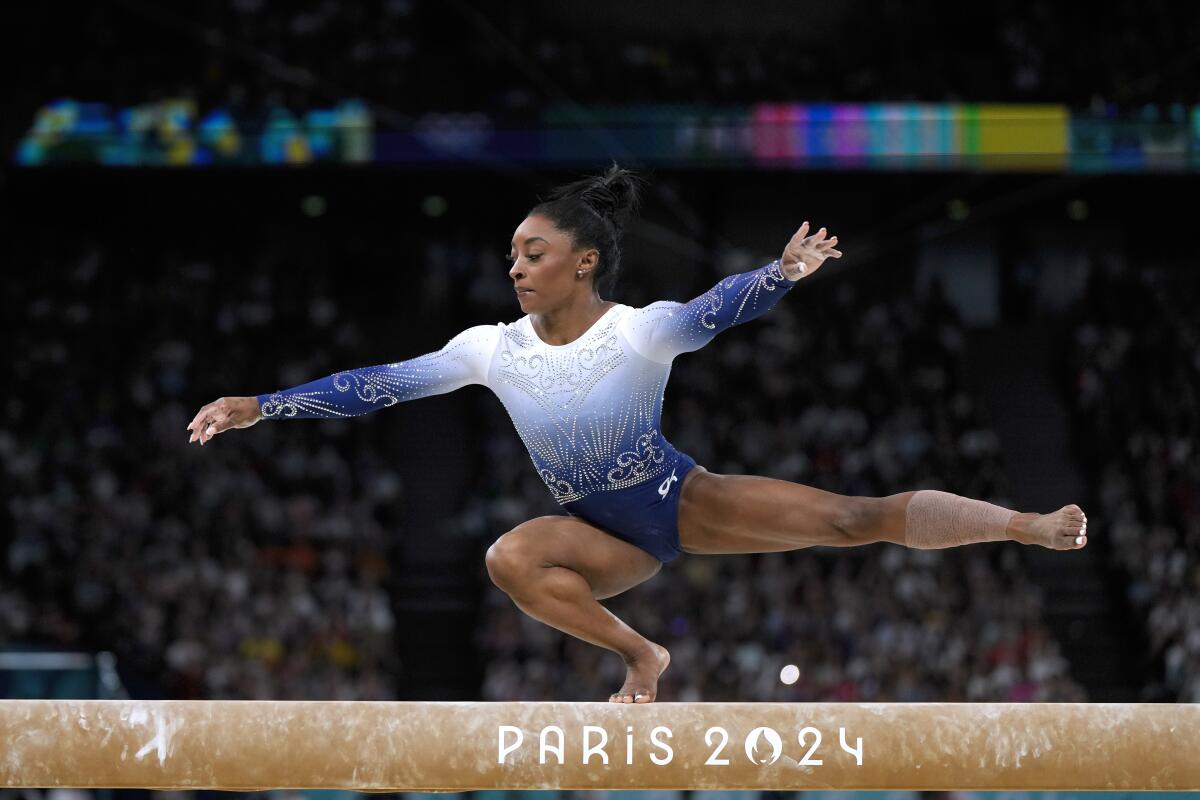 Simone Biles, of the United States, competes during the women's artistic gymnastics.