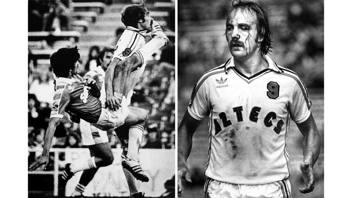 April 30, 1978: Los Angeles Aztecs' Ron Davies gets a kick in the face from Oakland Stompers' Paki Paunocich. A cut and blooded Davies, right, remained in the game.