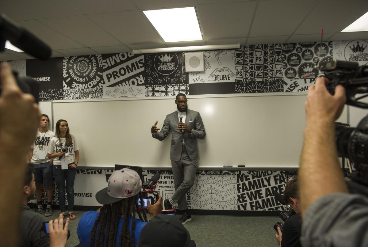 LeBron James speaks at a news conference after the opening ceremony for the I Promise School in Akron, Ohio, Monday, July 30, 2018. The I Promise School is supported by the The LeBron James Family Foundation and is run by the Akron Public Schools.