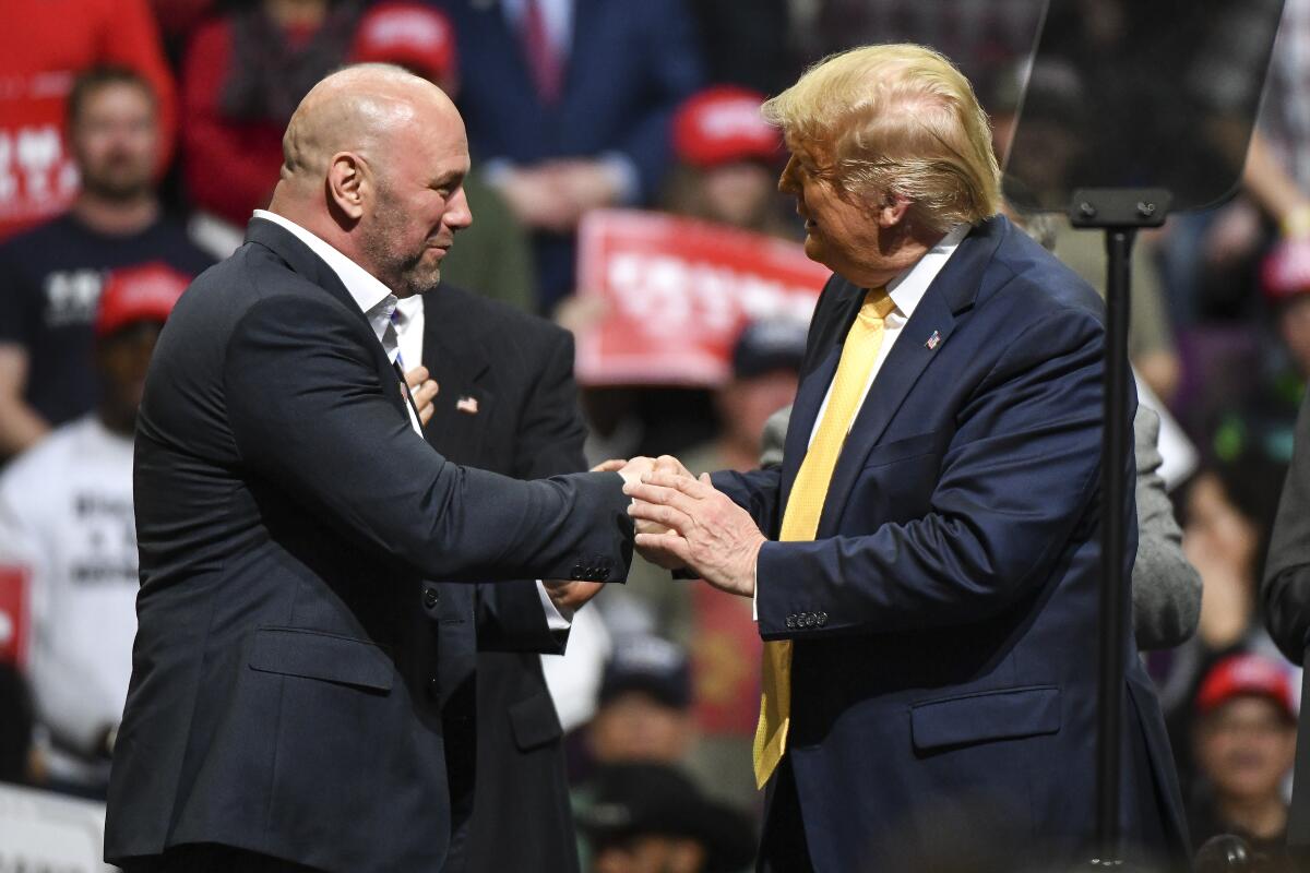 Dana White and President Trump at a Feb. 20 rally in Colorado.