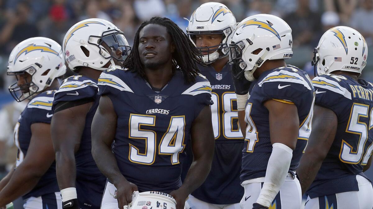 Chargers defensive end Melvin Ingram III (54) takes the field for a preseason game against the New Orleans Saints at StubHub Center in Carson on Saturday.