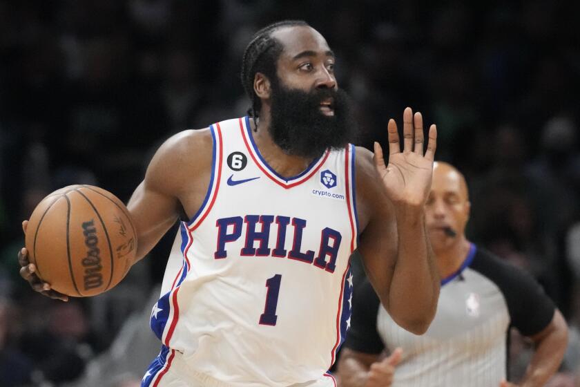 FILE -Philadelphia 76ers guard James Harden (1) calls to teammates during the first half of Game 5.