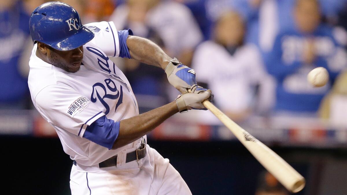 Kansas City Royals center fielder Lorenzo Cain hits a two-run single in the second inning of a 10-0 win over the San Francisco Giants in Game 6 of the World Series on Tuesday.