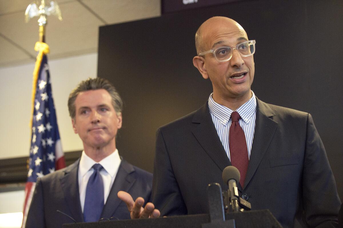 Dr. Mark Ghaly, California Health and Human Services Agency secretary, speaks at a news conference.