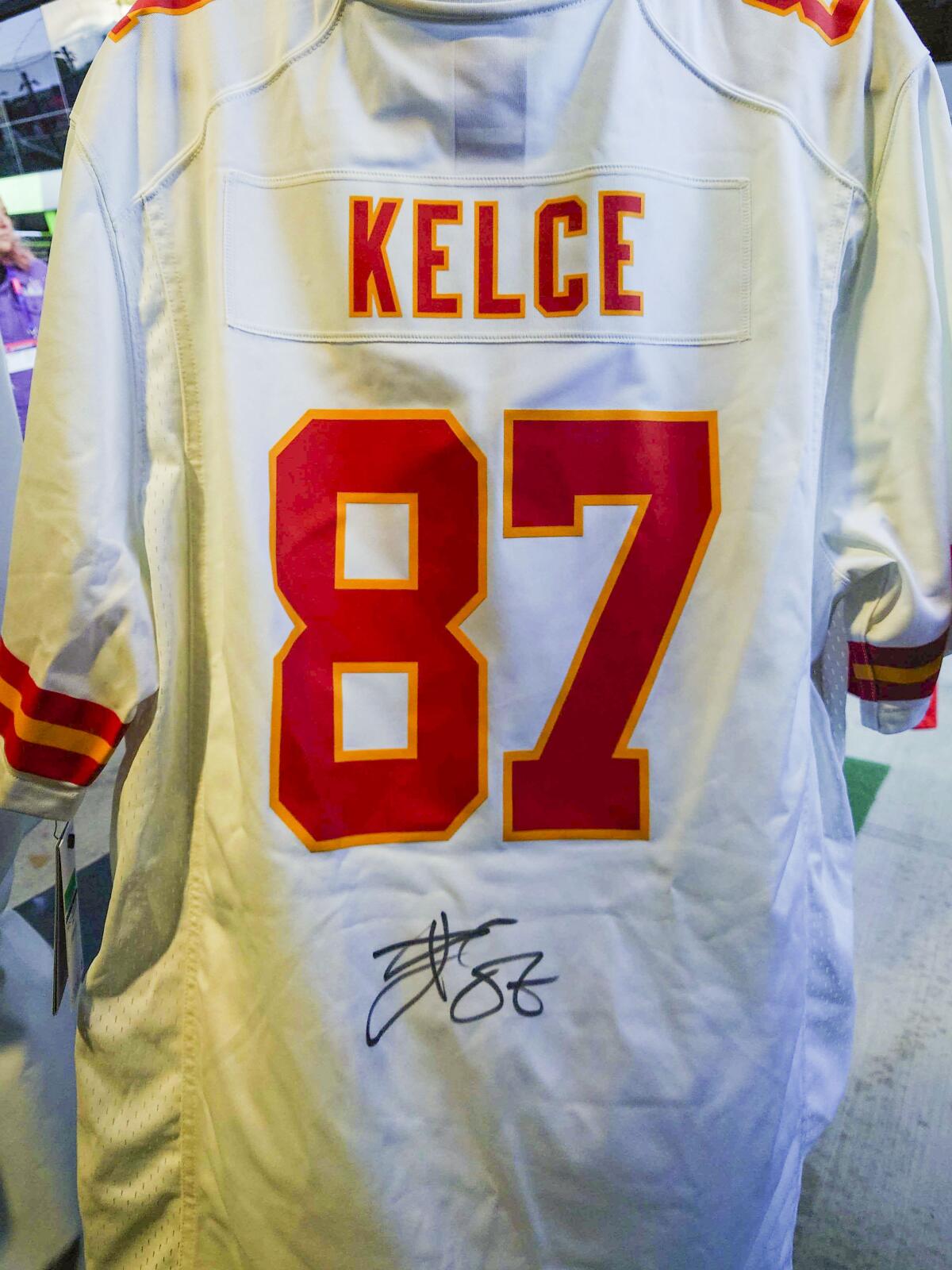 An autographed Kelce jersey.