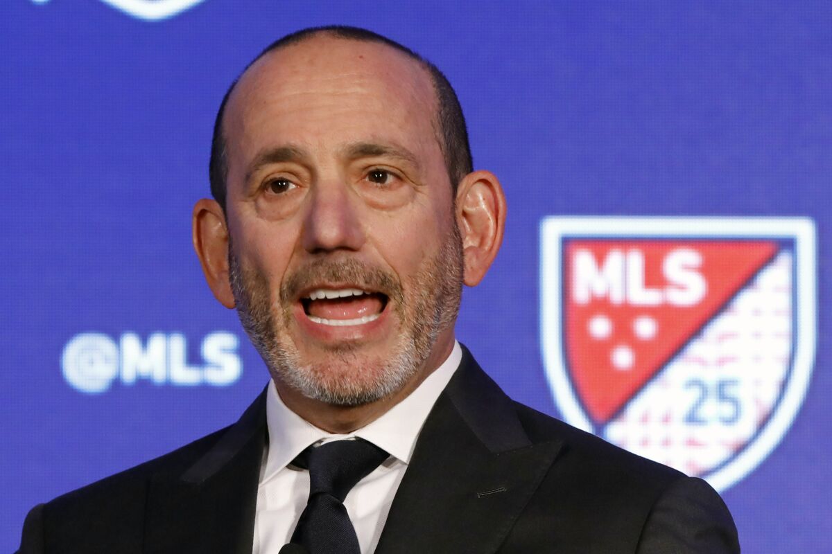 FILE - In this Feb. 26, 2020, file photo, Major League Soccer Commissioner Don Garber speaks during the Major League Soccer 25th Season kickoff event in New York. For Garber, a native New Yorker, Sept. 11 was not only emotionally wrenching on a personal level, it would test his resolve as commissioner just two years into the job. (AP Photo/Richard Drew, File)