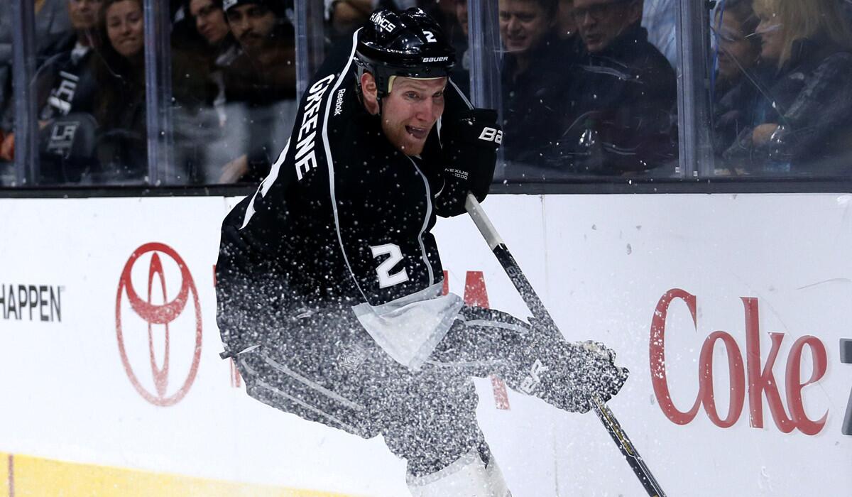 Kings defenseman Matt Greene brings the puck out of the corner against a 3-2 win over the Hurricanes on Thursday.
