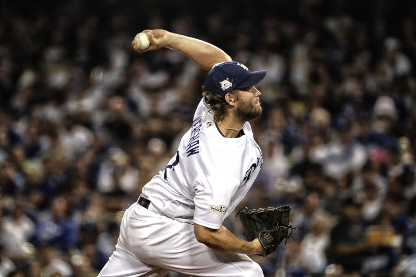 Clayton Kershaw pitches in the fifth inning against the Diamondbacks during Game 1 of the National League division series at Dodger Stadium.