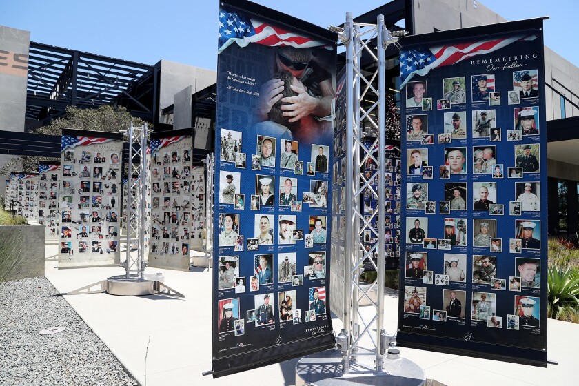"Remember our dead" a traveling photo exhibit at Anduril on Wednesday, June 29, 2022 in Costa Mesa, CA. 