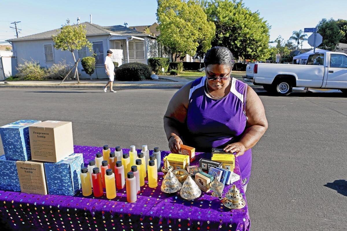 Jackie Lloyd sells body oils, shea butter, soap and incense after having been laid off from her job as an elementary school cafeteria worker four years ago.
