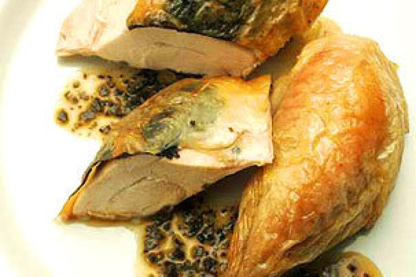 Roasted chicken with truffles and truffle butter.