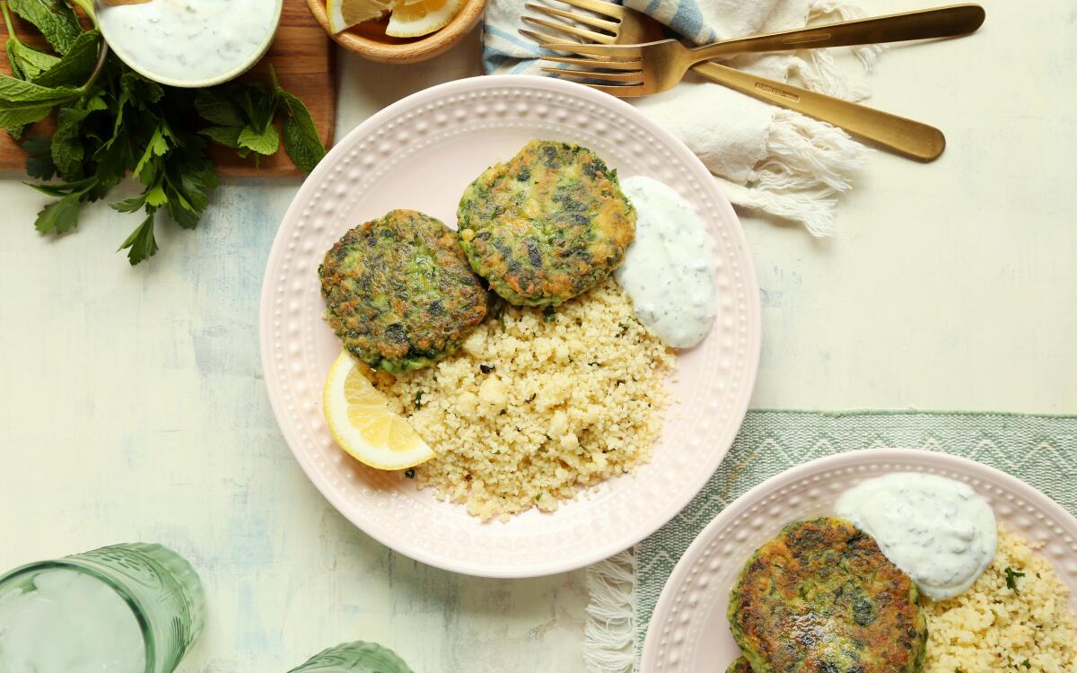 Green peas add brightness to these pan-fried falafel-like patties served with lemony couscous and a bright yogurt sauce.