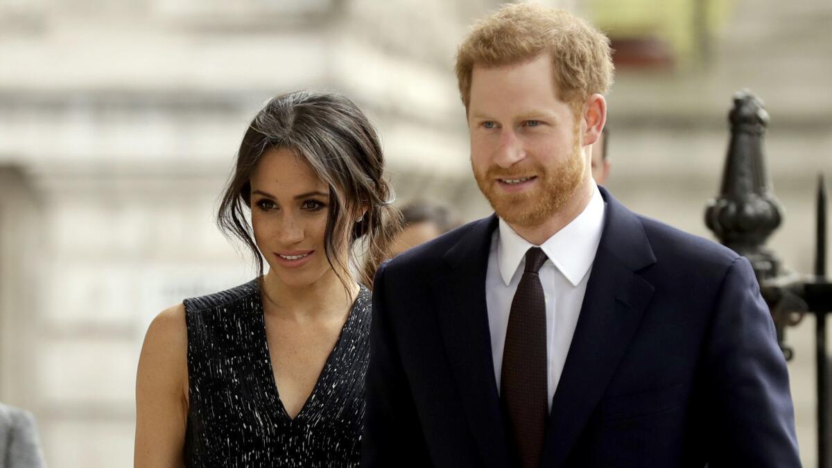 Britain's Prince Harry and his fiancee Meghan Markle arrive to on April 23.