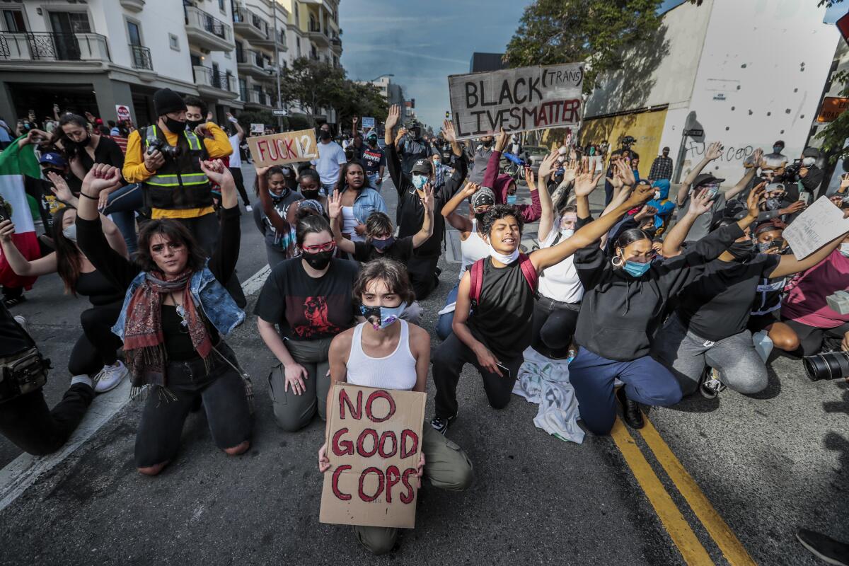 Protesters face off with police in downtown Santa Monica