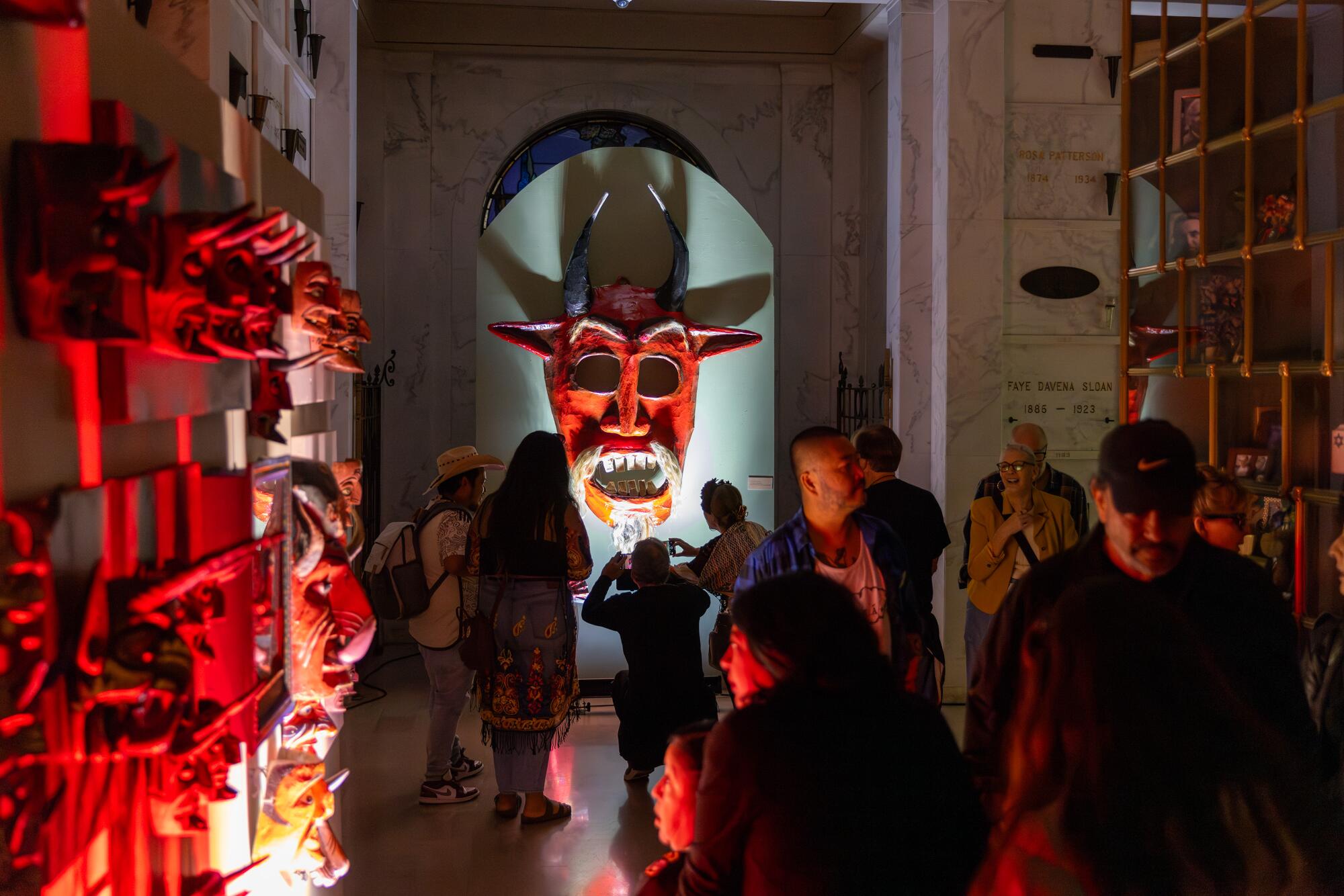 The exhibition of masks on display inside the mausoleum at the Hollywood Forever Cemetery.