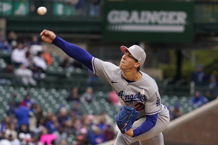 Dodgers starting pitcher Walker Buehler throws against the Cubs in Chicago Sunday.