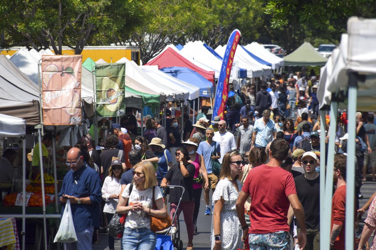 Customers flocked to Irvine Farmers Market in the parking lot of Mariners Church in July 2022.