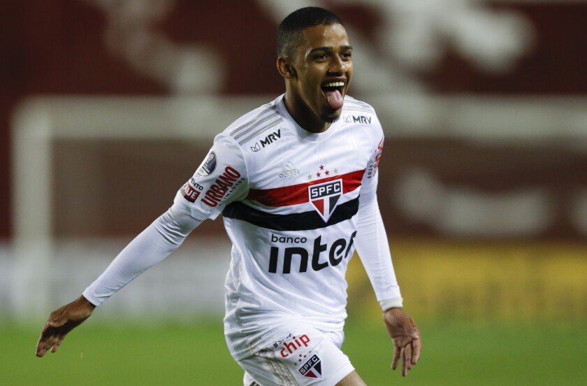 FILE - Brenner of Brazil's Sao Paulo celebrates after scoring his side's second goal during a Copa Sudamericana soccer match against Argentina's Lanus at La Fortaleza Stadium in Buenos Aires, Argentina, in this Wednesday, Oct. 28, 2020, file photo. FC Cincinnati also has a potential young star to build around. Brenner, a 21-year-old Brazilian forward, was the big offseason signing by Cincinnati. (Agustin Marcarian/Pool via AP, File)