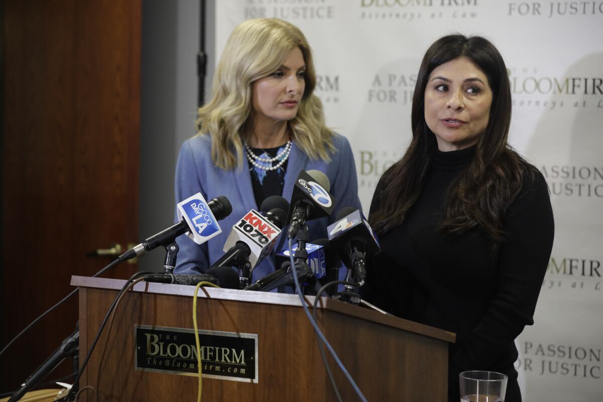 LAPD Detective Ysabel Villegas, right, speaks during a news conference with her attorney, Lisa Bloom.