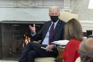 President Joe Biden speaks with House Speaker Nancy Pelosi of Calif., and other House Democratic Leaders in the Oval Office of the White House, Friday, Feb. 5, 2021, in Washington. (AP Photo/Alex Brandon)