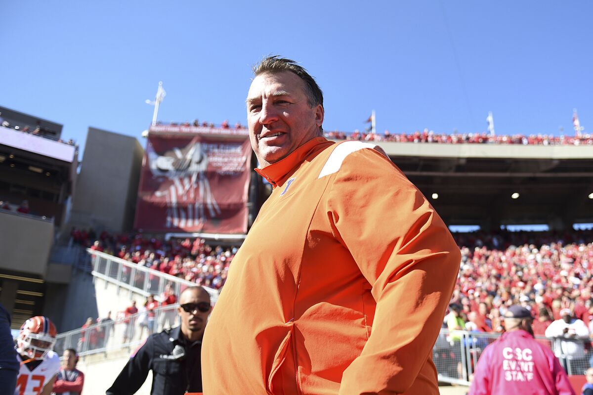 Illinois head coach Bret Bielema watches before an NCAA college football game against Wisconsin, Saturday, Oct. 1, 2022, in Madison, Wis. (AP Photo/Kayla Wolf)