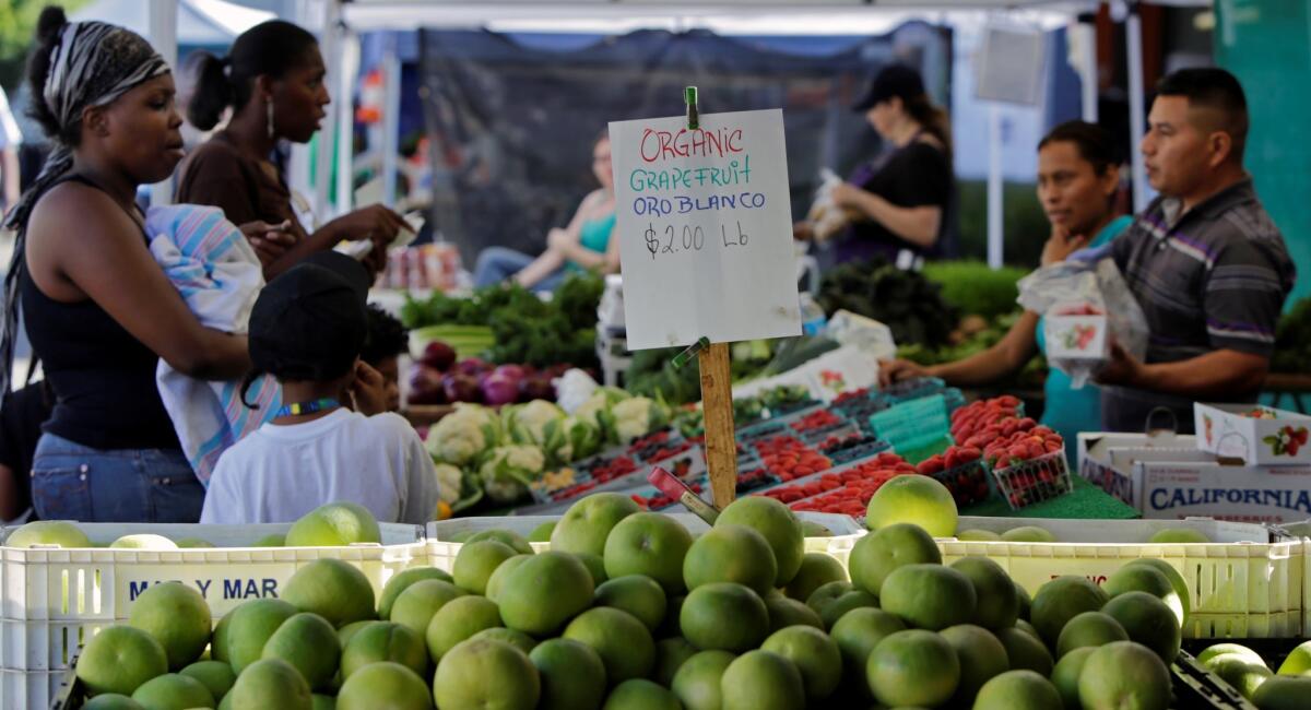 Shoppers at the Baldwin Hills/Crenshaw farmers market.