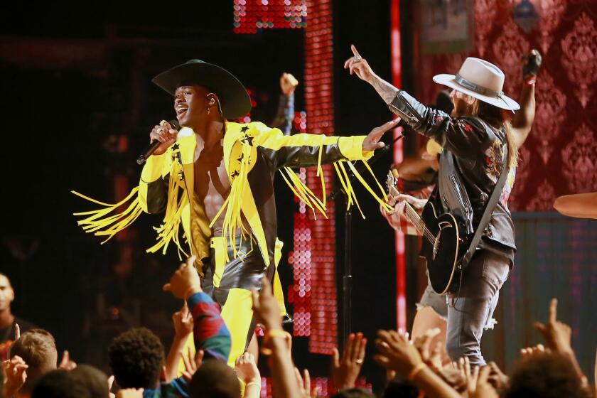 LOS ANGELES, CALIFORNIA - JUNE 23: Lil Nas X and Billy Ray Cyrus perform onstage at the 2019 BET Awards at Microsoft Theater on June 23, 2019 in Los Angeles, California. (Photo by Leon Bennett/Getty Images)