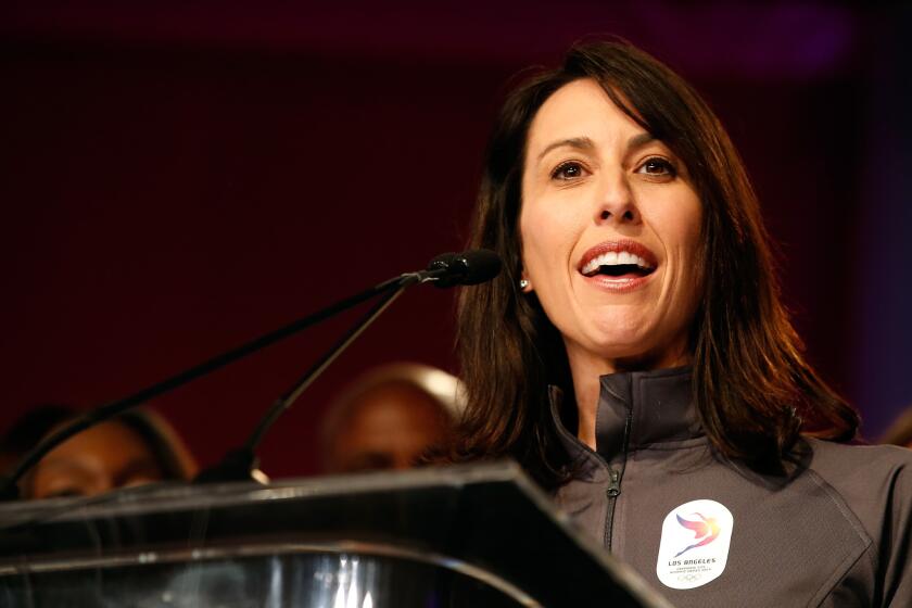 Janet Evans speaks at the USOC Olympic media summit at the Beverly Hilton on March 8.