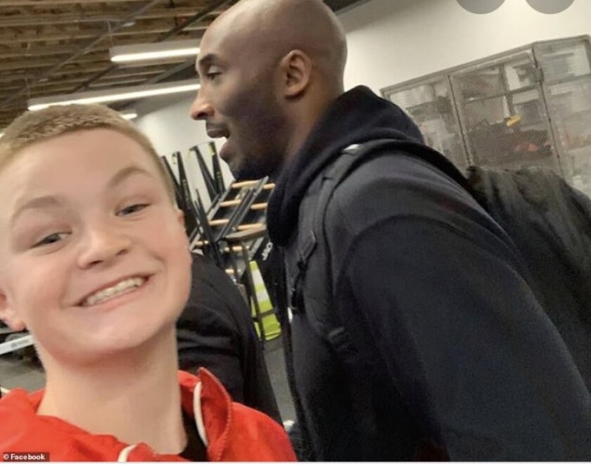 Brady Smigiel, left, was 13 in 2020 when he took this
 selfie with Kobe Bryant.