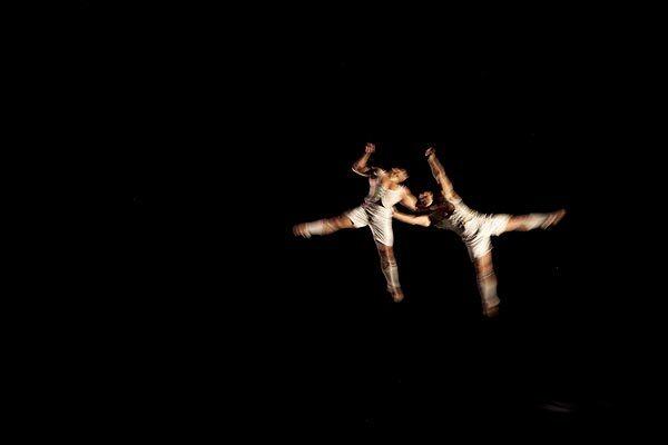 Cirque du Soleil performers sail through the air above the audience during a sneak preview of the company's new production "Iris" that was performed at the Kodak Theatre in Hollywood on Thursday.