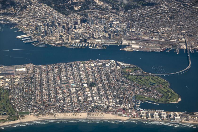 San Diego CA - March 26: San Diego Bay is flanked by Coronado and downtown San Diego on Tuesday, March 26, 2024. (K.C. Alfred / The San Diego Union-Tribune)