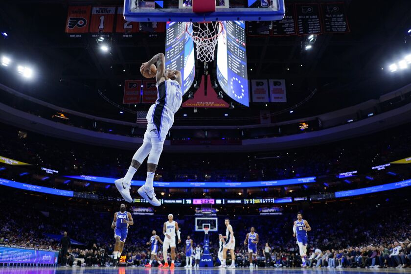 Orlando Magic's Markelle Fultz goes up for a dunk during the second half of an NBA basketball game against the Philadelphia 76ers, Monday, Jan. 30, 2023, in Philadelphia. (AP Photo/Matt Slocum)