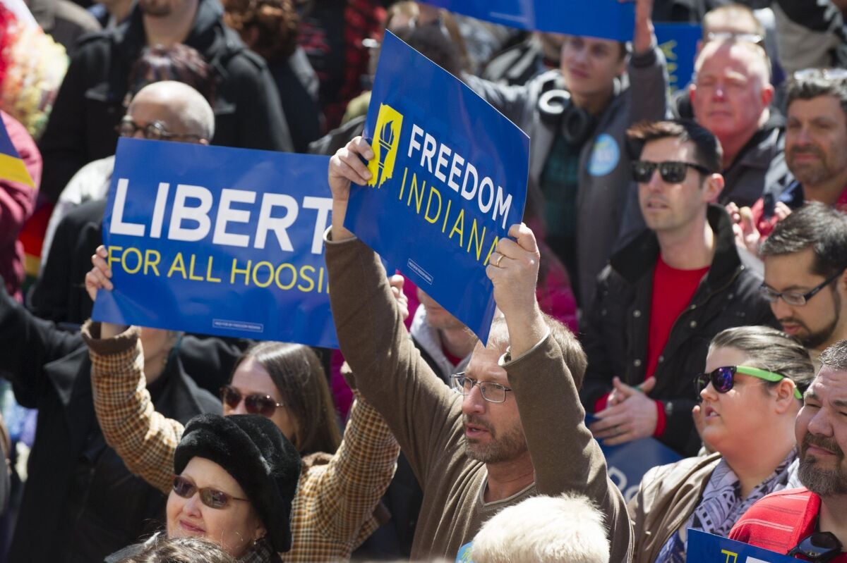 Thousands of opponents of Indiana Senate Bill 101, the Religious Freedom Restoration Act, protest outside the Indiana State House on Saturday.
