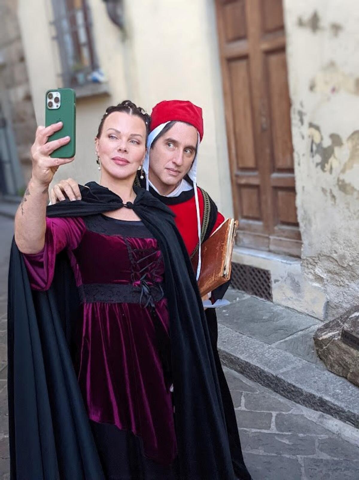 Hershey Felder, right, and actor Debi Mazar filming "Dante and Beatrice in Florence" on the streets of Florence, Italy.