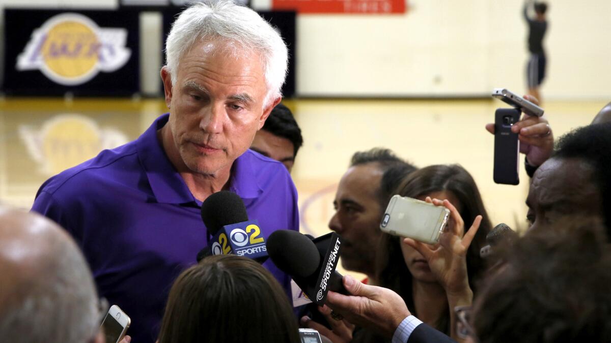 Lakers General Manager Mitch Kupchak talks to reporters after Jahlil Okafor worked out for the team at its practice facility.