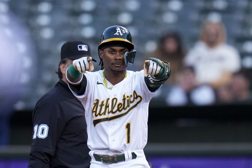 Oakland Athletics' Esteury Ruiz gestures after hitting an RBI single against the Atlanta Braves during the fifth inning of a baseball game in Oakland, Calif., Tuesday, May 30, 2023. (AP Photo/Godofredo A. Vásquez)