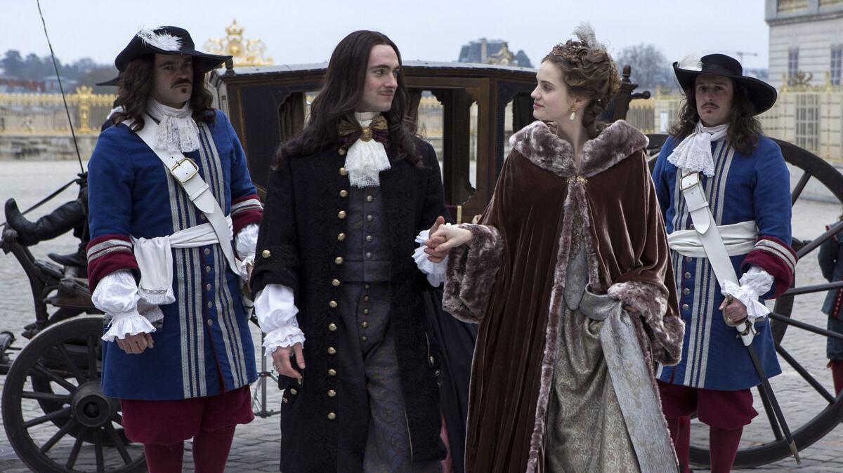 George Blagden as Louis XIV and Noemie Schmidt as Henriette in "Versailles."