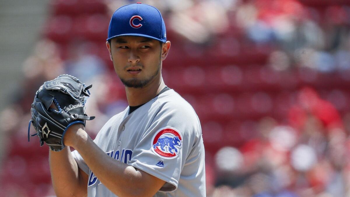 Chicago Cubs pitcher Yu Darvish prepares to throw against the Cincinnati Reds.