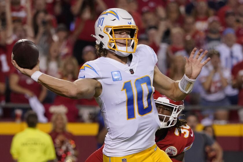 Los Angeles Chargers quarterback Justin Herbert throws during the second half.