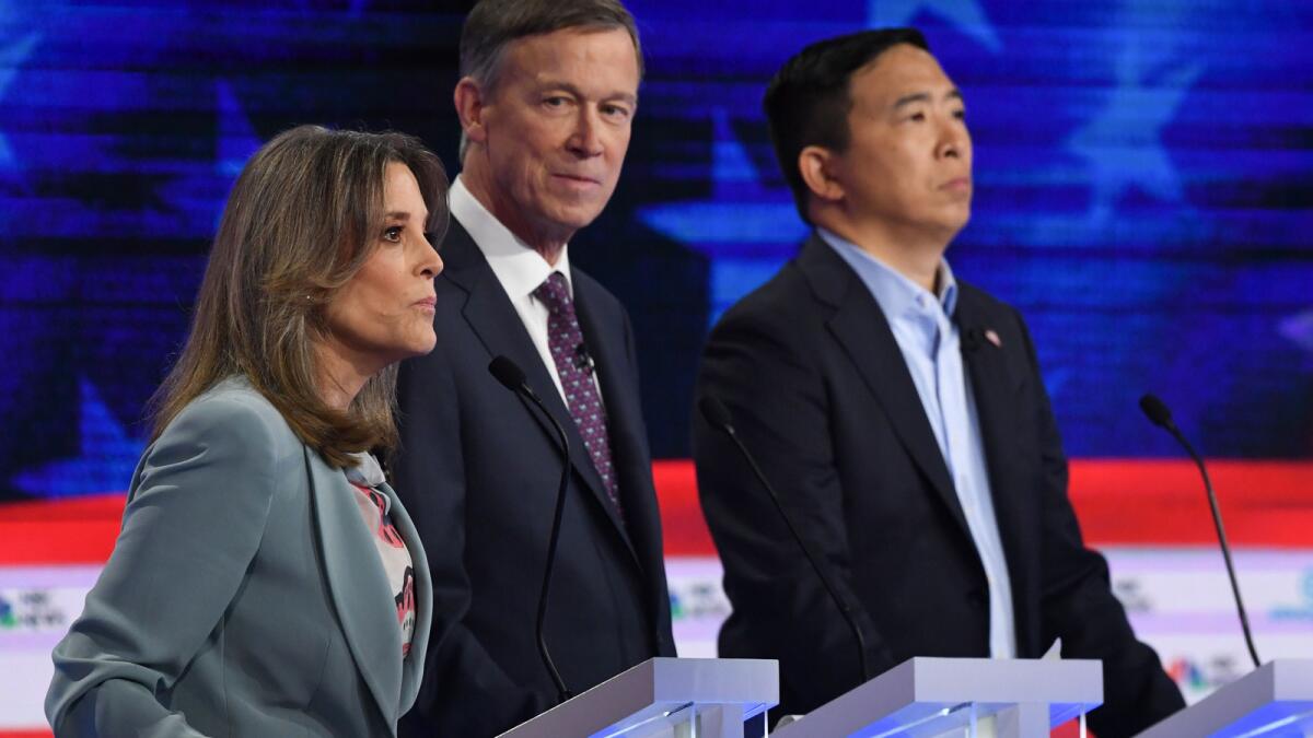 From left, Marianne Williamson, John Hickenlooper and Andrew Yang.