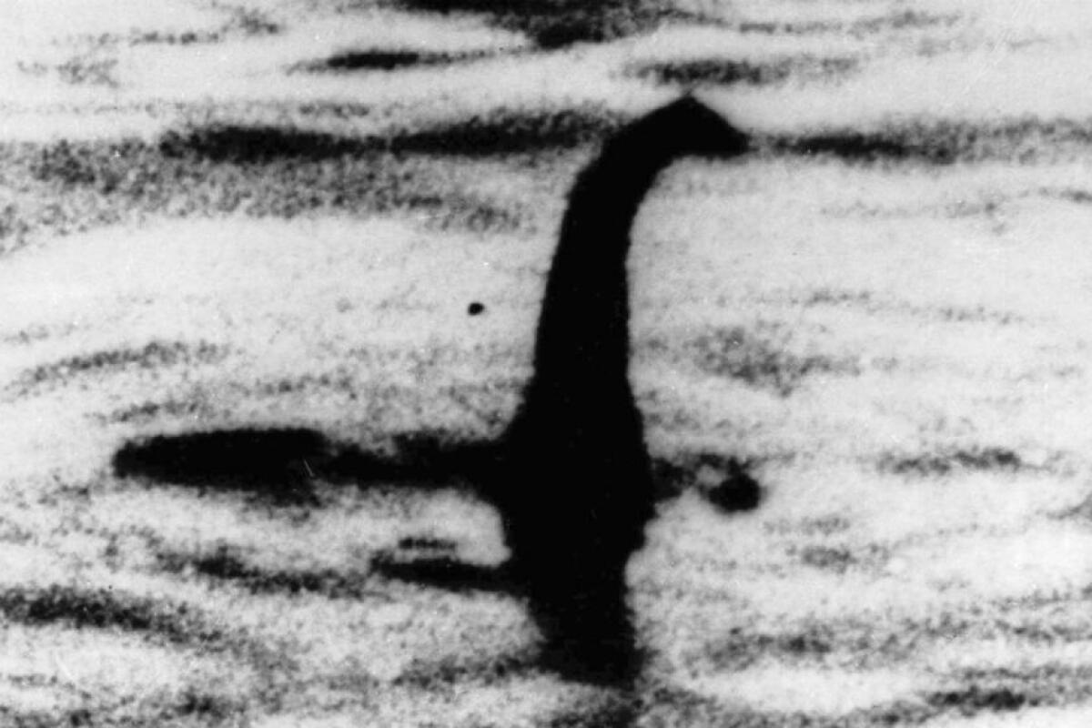 An undated file photo from Scotland shows a shadowy shape that some people say is a Loch Ness monster.