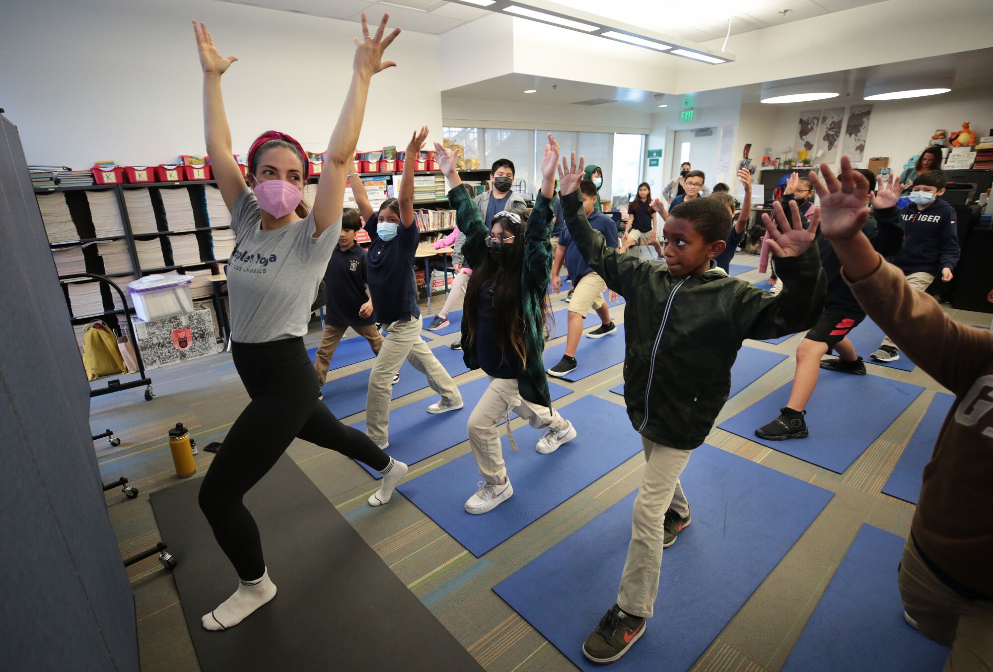Lea-Rose Gallegos, co-founder of People Yoga, leads a class of fifth graders.