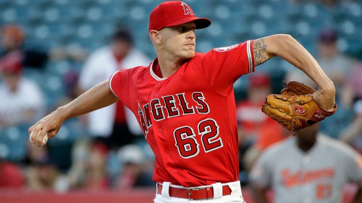 Angels starting pitcher Parker Bridwell throws against the Baltimore Orioles during the first inning on Tuesday.