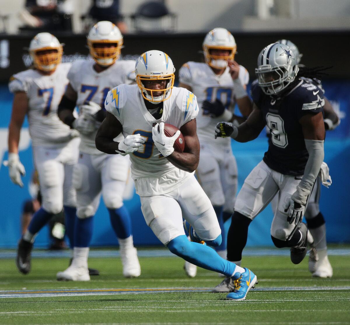 Chargers' Mike Williams runs with the football against the Dallas Cowboys.