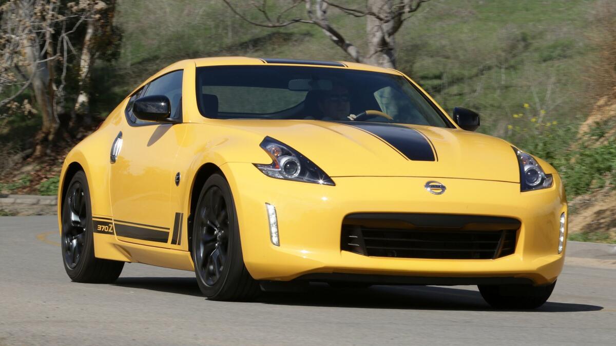 The 2018 Nissan 370Z Heritage Edition has special cosmetic features — including exterior decals and yellow interior trim — that separate it from standard Zs offered by Nissan.