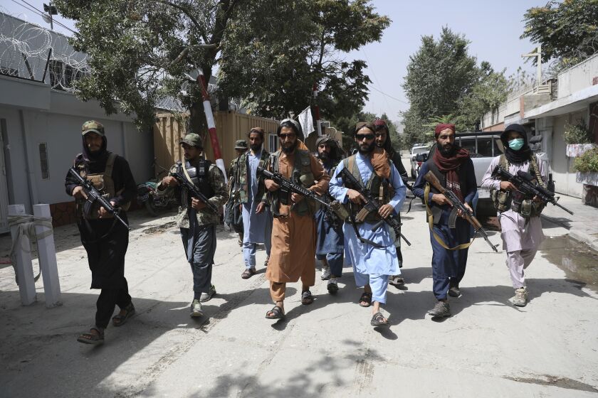 Taliban fighters patrol in the Wazir Akbar Khan neighborhood in the city of Kabul, Afghanistan, Wednesday, Aug. 18, 2021. The Taliban declared an "amnesty" across Afghanistan and urged women to join their government Tuesday, seeking to convince a wary population that they have changed a day after deadly chaos gripped the main airport as desperate crowds tried to flee the country. (AP Photo/Rahmat Gul)